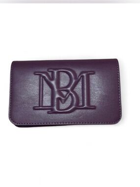 Badgley Mischka Debossed Logo Crossbody in the color Plum.